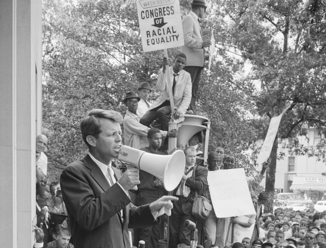 Attorney General Robert F. Kennedy speaks outside the Justice Department in June 1963. (Credit: Warren K. Leffler, public domain, via Wikimedia Commons)